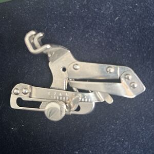 Singer Sewing 35931 the adjustable hemmer low-shank presser-foot attachment